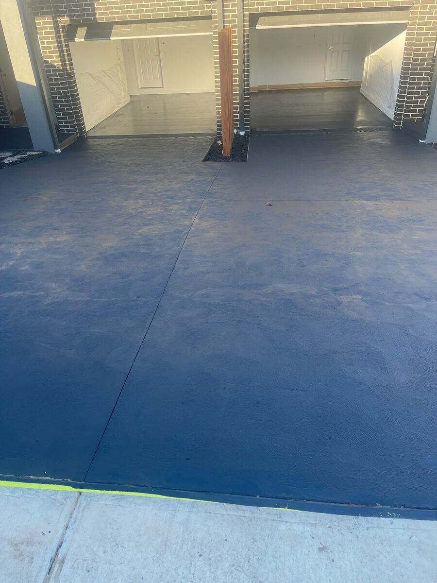 Garage floor coated in blue epoxy