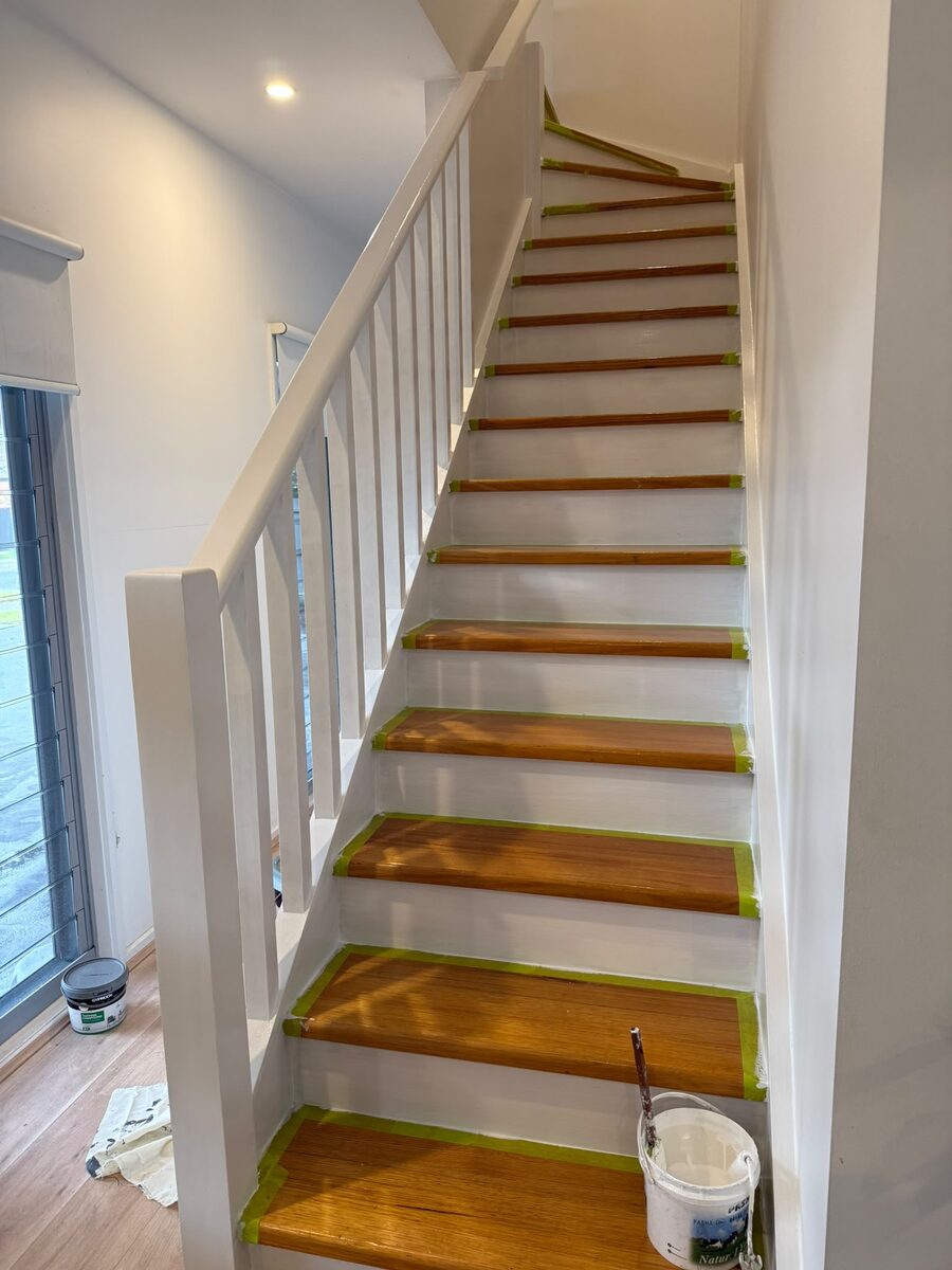 Timber staircase being stained