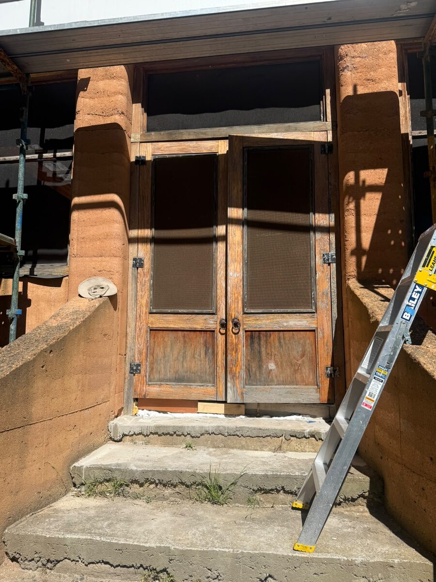 Timber doors being stripped back for refinishing